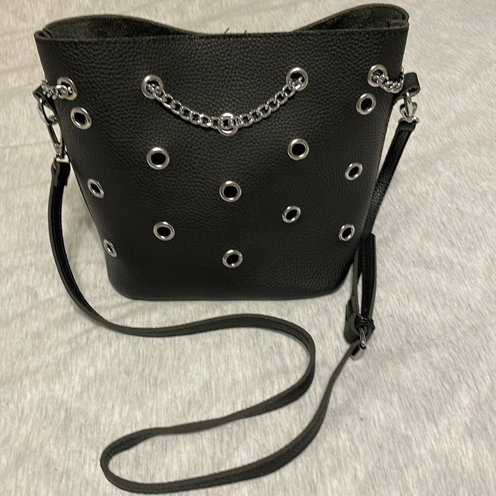 Black pocketbook.  Can be use as a crossover bag.  Worn twice.